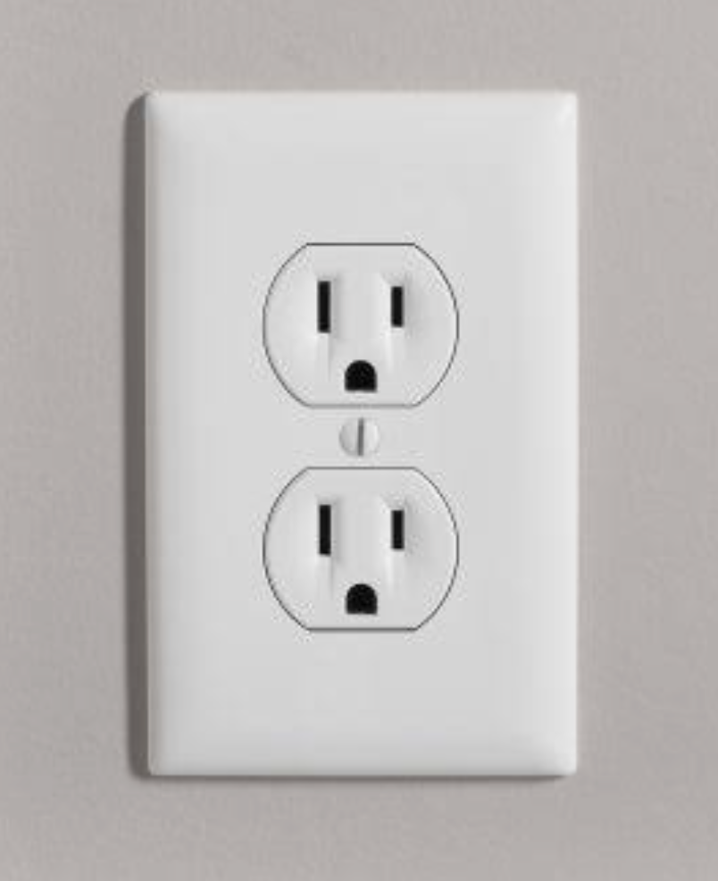 White duplex electrical outlet on an interior wall